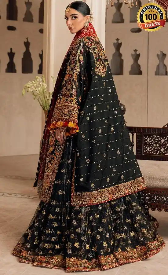 Embroidered black sharara suit for wedding guests with sequinned work and tassel detailing