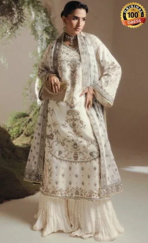 White sharara suit for wedding guests with elegant hand embroidery and silk detailing