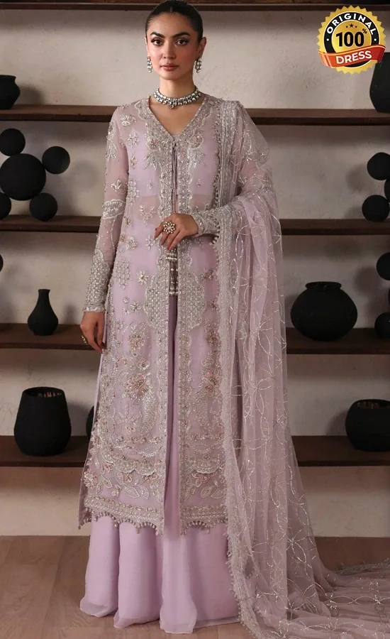 Pakistani Baby Pink Salwar Kameez For Wedding Guests Pakistani baby pink salwar kameez for wedding guests with embroidered chiffon, organza and elegant festive detailing