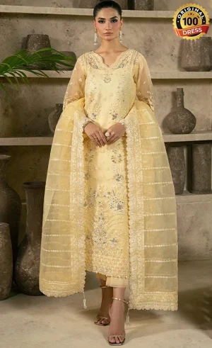 Pastel yellow salwar kameez for wedding guests with elegant embroidery and organza detailing