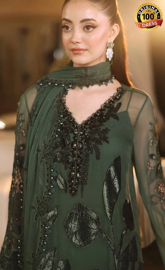 Dark green organza salwar kameez with hand embroidery, 3D flowers and embellished detailing