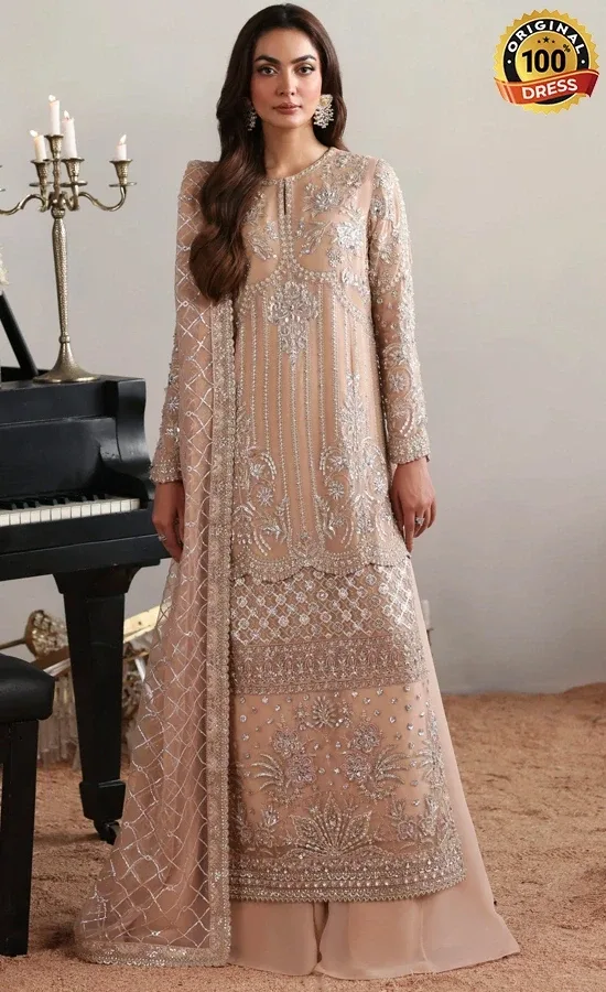 Pink Colour Salwar Kameez For Wedding Guests Pink colour salwar kameez for wedding guests with elegant hand embroidery and chiffon detailing