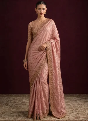 Pink embroidered saree for wedding guests with matching blouse, delicate sequin embroidery and decorative lace detailing