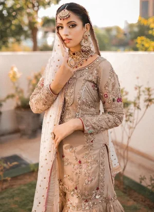 Pakistani light brown bridal gharara with luxury hand embroidery and elegant wedding wear finishing