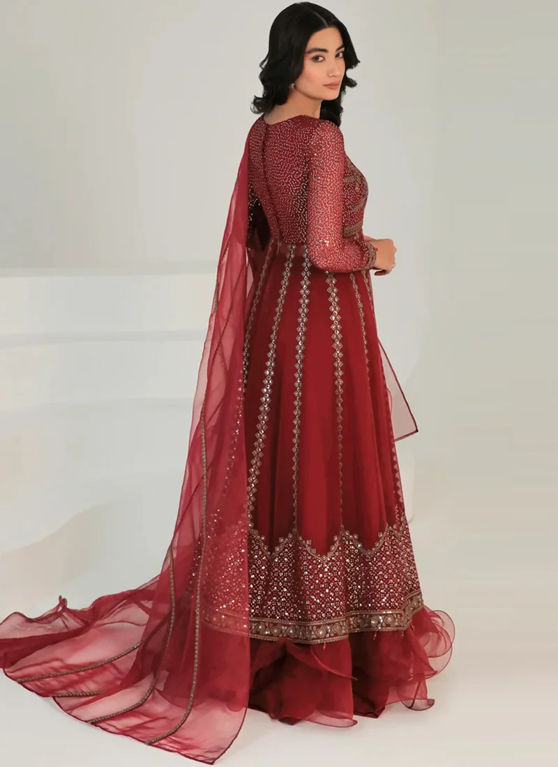 Maroon wedding guest lehenga paired with dyed organza dupatta and detailed embroidery