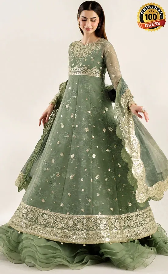 mbroidered green maxi dress with tassels, samosa lace and detailed hand finishing