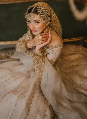Ivory gold Nikkah bridal dress crafted with organza, raw silk and detailed hand embroidery