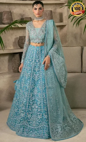 Teal lehenga for wedding guests with elegant hand embroidery and organza detailing