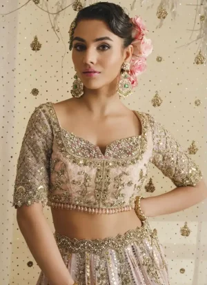 Soft dusty pink Nikkah lehenga with sweetheart Brocia choli and organza dupatta