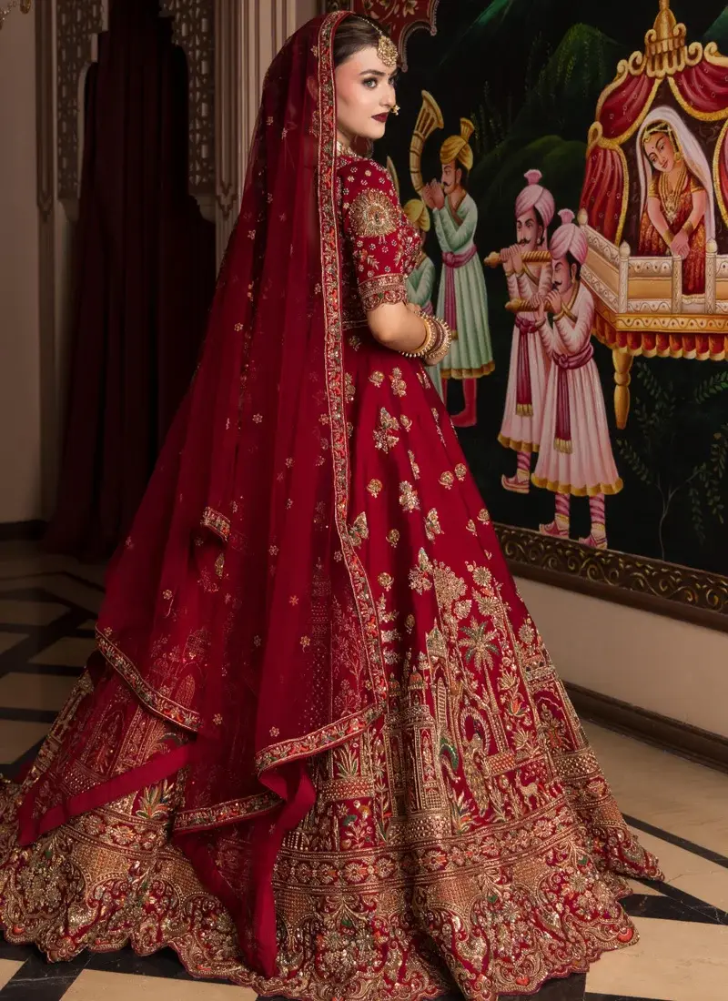 Candy red embroidered bridal lehenga choli with elegant resham work and ornate motif detailing