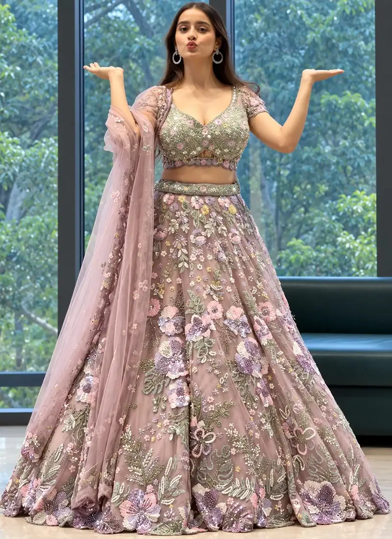 Dusty Mauve Bridal Lehenga Choli Dusty mauve 3D floral lehenga choli with deep-V net blouse, embellished belt and organza dupatta