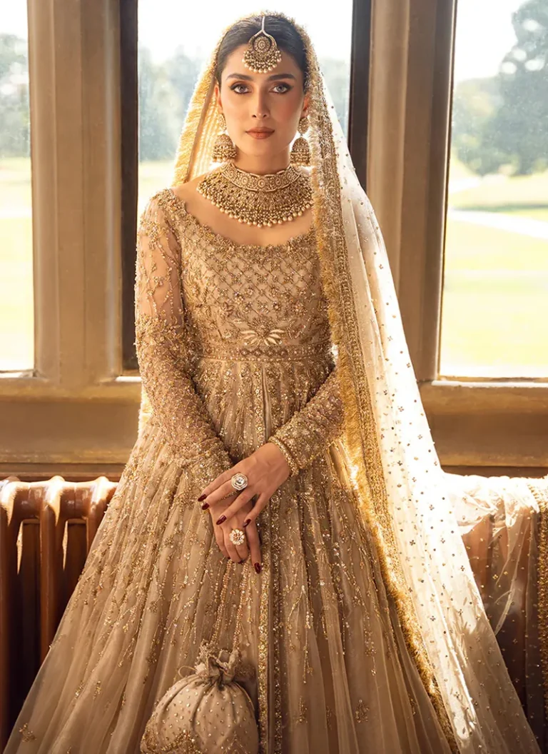 Luxury golden hand embellished pishwas with intricate embroidery and elegant Eastern bridal wear design