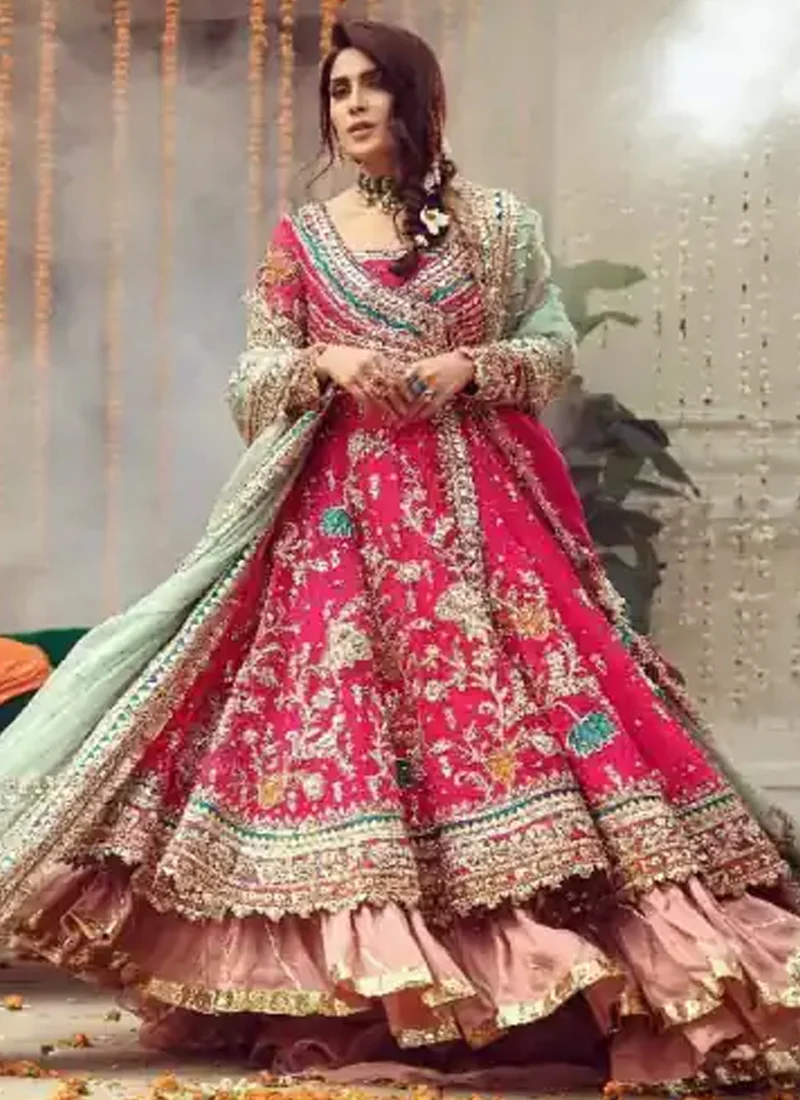 Shocking pink Angrakha lehenga bridal dress with elegant traditional Pakistani styling