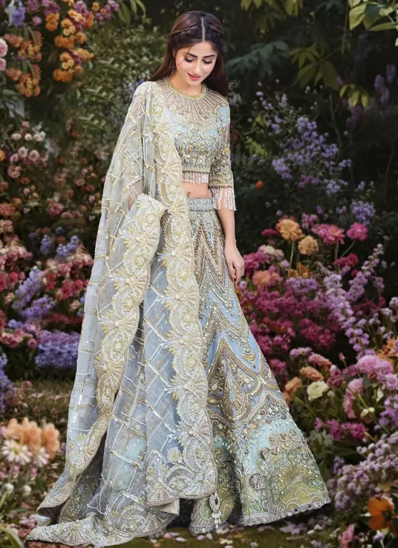 Ice Blue Nikkah Frock with Lehenga with Paisley Arch Panels Ice blue bridal lehenga choli full-length front view with ornate paisley panels and sheer floral dupatta