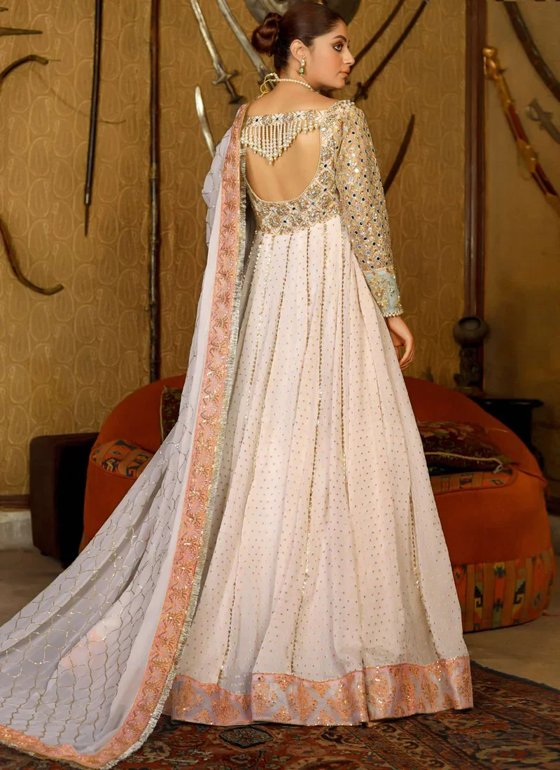 Off white bridal pishwas full back view showing pearl-fringed open neckline and flowing embroidered panels