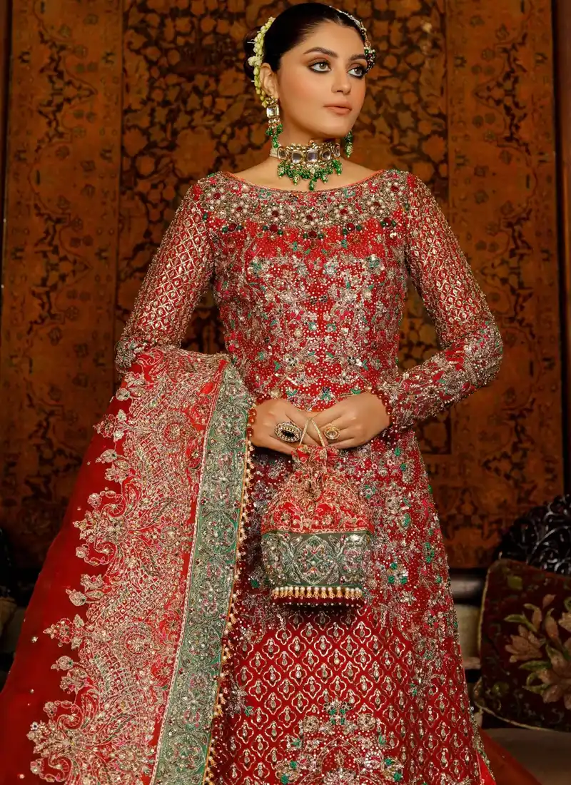 Red bridal long shirt and lehenga back view with a keyhole neckline and sweeping floral brocade trail