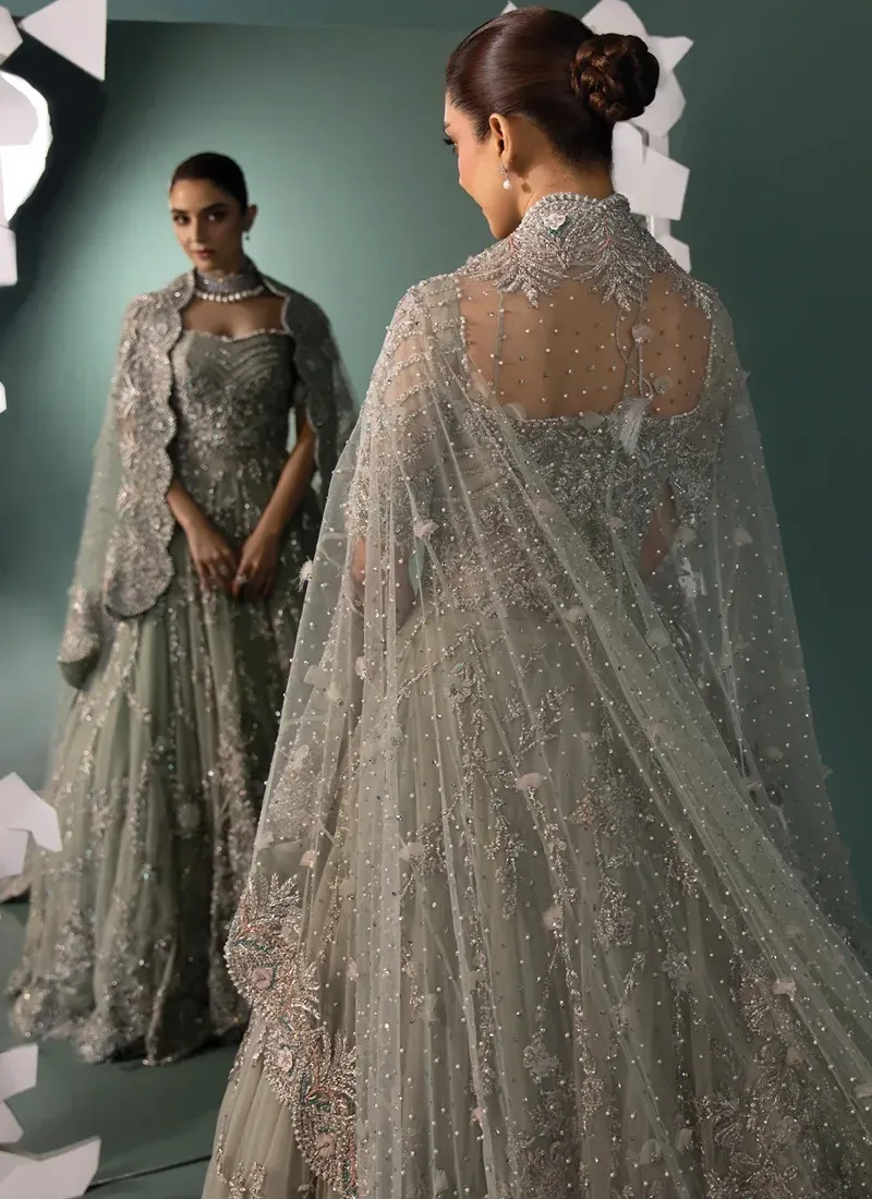 Sage green bridal gown full front view with silver floral embroidery and a long embellished net dupatta.